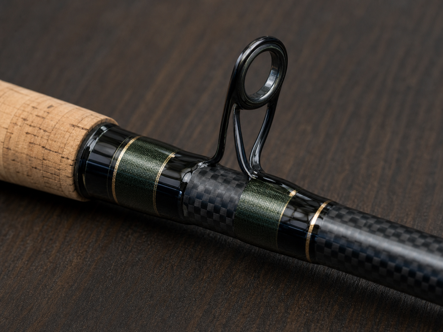 Close-up of a custom rod guide wrap and cork grip